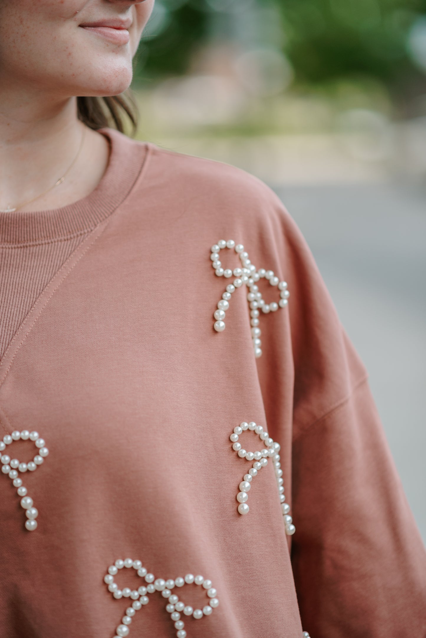 Pearl Bow Embellished Cropped Sweatshirt